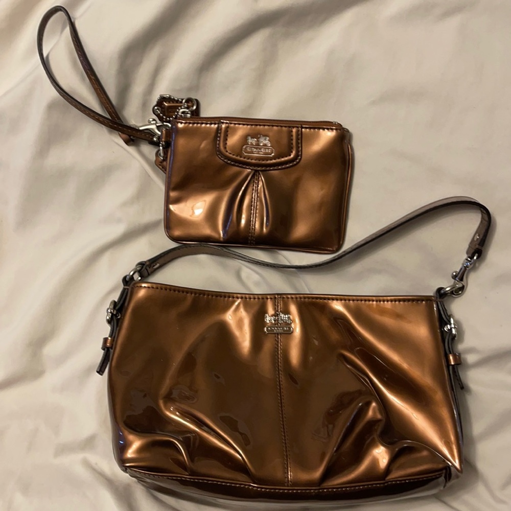 Bronze metallic Coach wristlet and small handbag